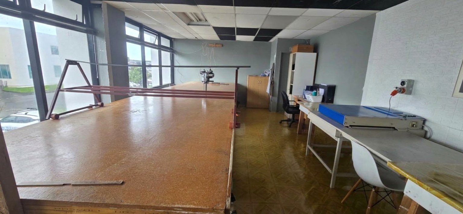 Large cutting table in a clothing production workshop